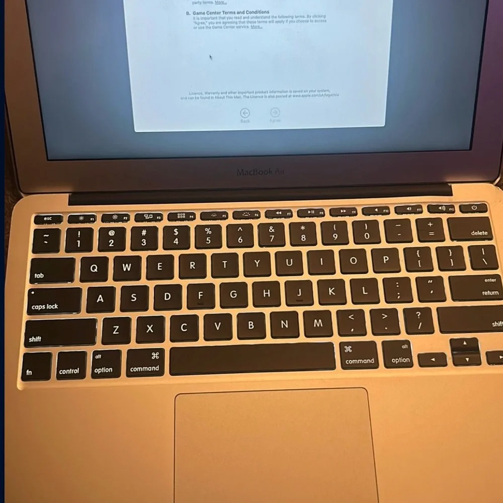 Apple Laptop in Silver and Black